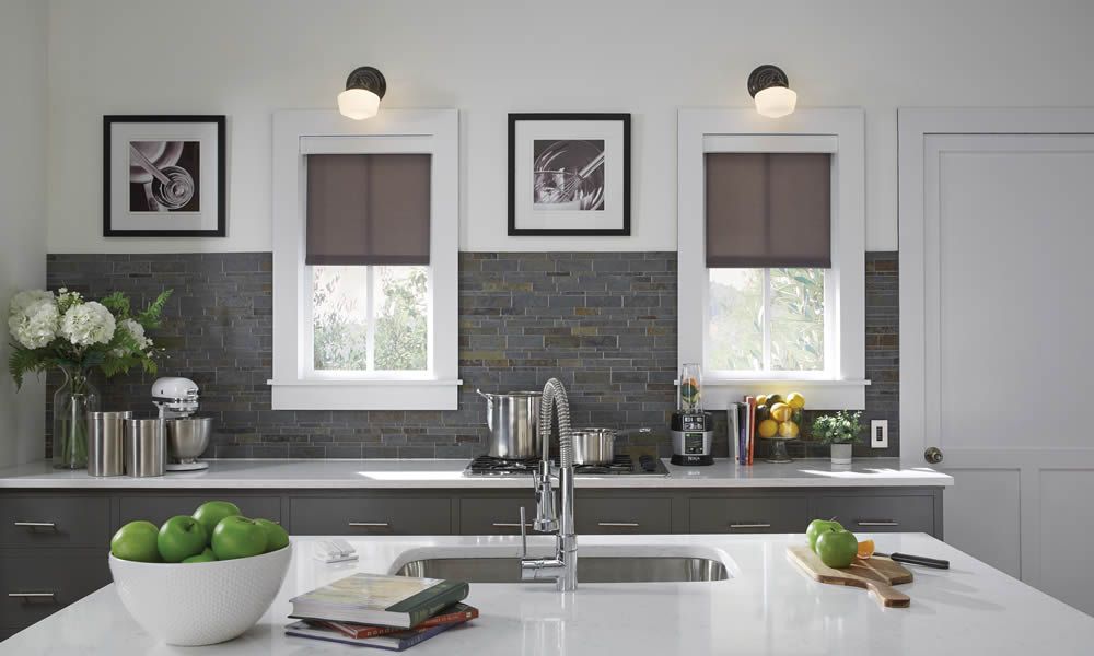 Lutron automated shades on kitchen windows
